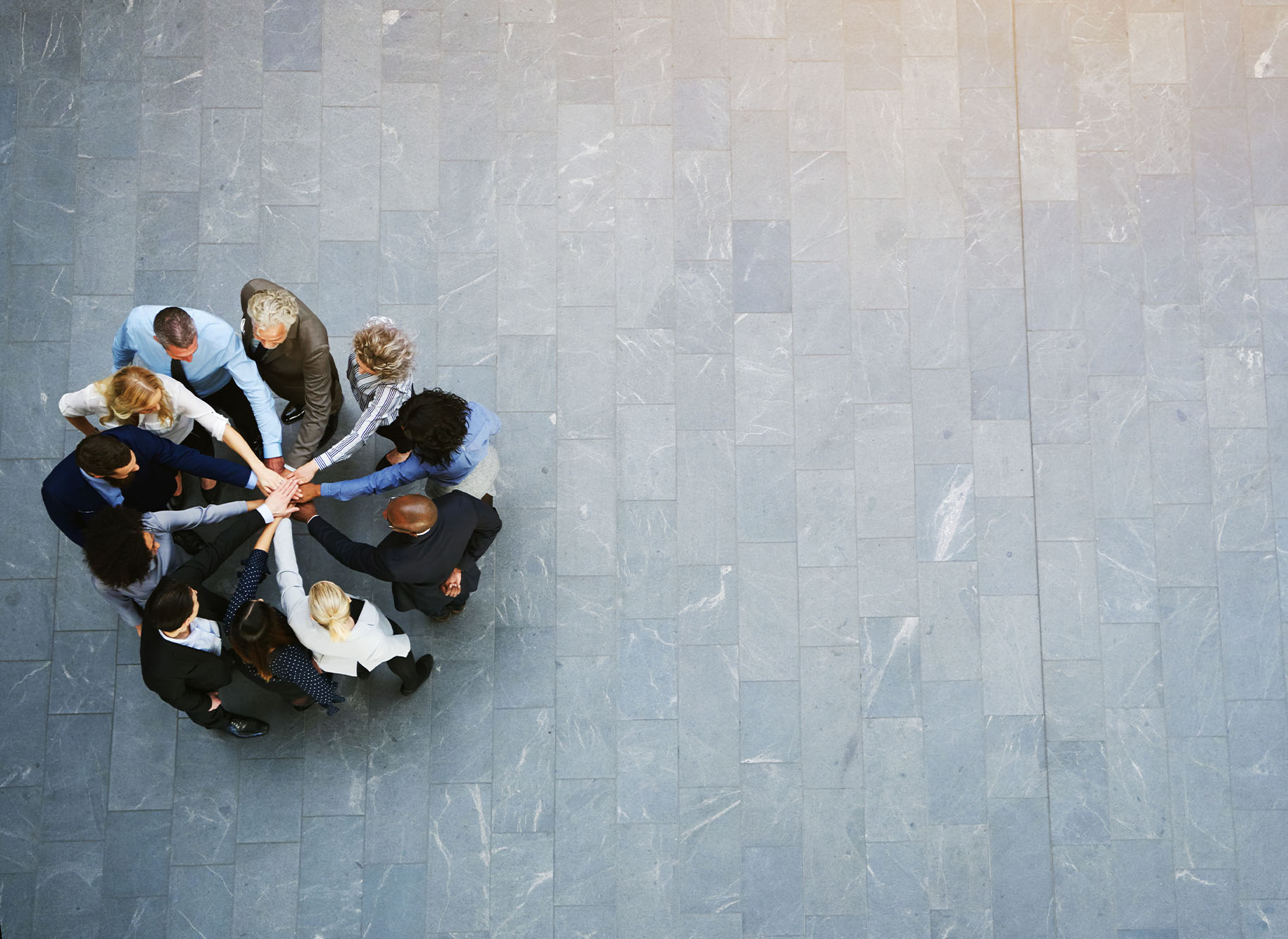 mission image with corporate prople forming a circle